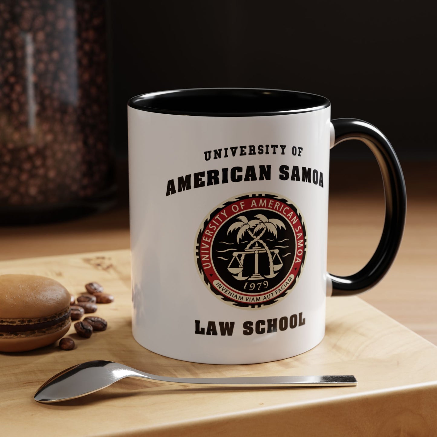 Kitchen view of 11 oz Ceramic mug with black handle featuring University of American Samoa Law School logo from Better Call Saul on both sides.