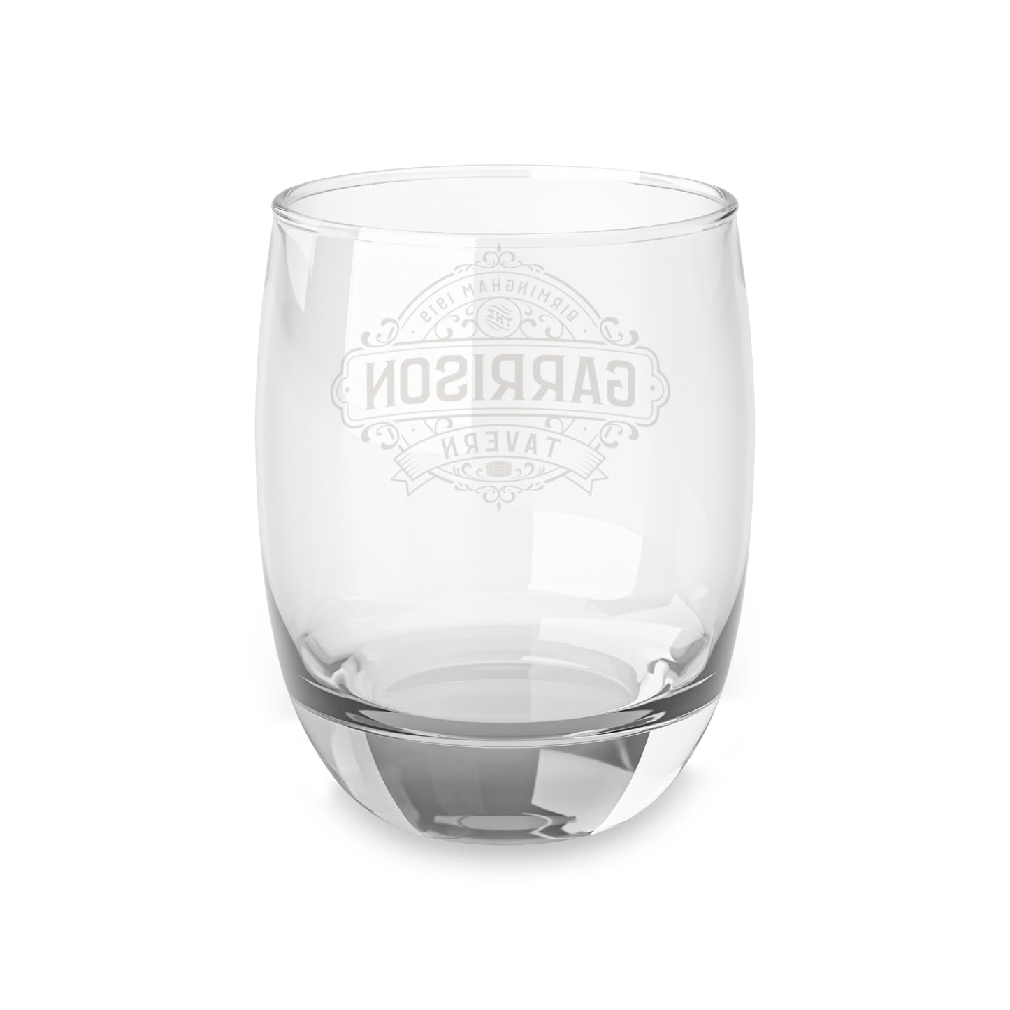 Back side view of a 6 ounce Whiskey Glass featuring the Garrison Tavern Bar Logo Graphic inspired by the TV show and movie Peaky Blinders printed on one side, sold by ScriptedBrand.