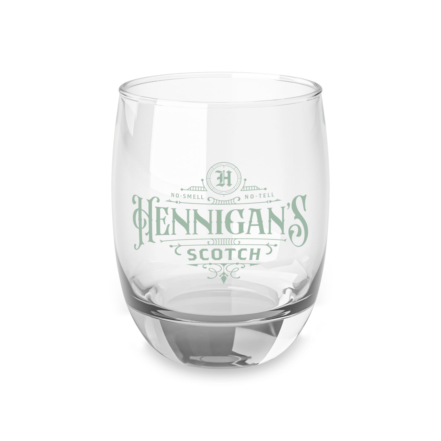 mockup of 6 ounce Whiskey Glass with Hennigan's Scotch logo designed by ScriptedBrand from the TV show Seinfeld.