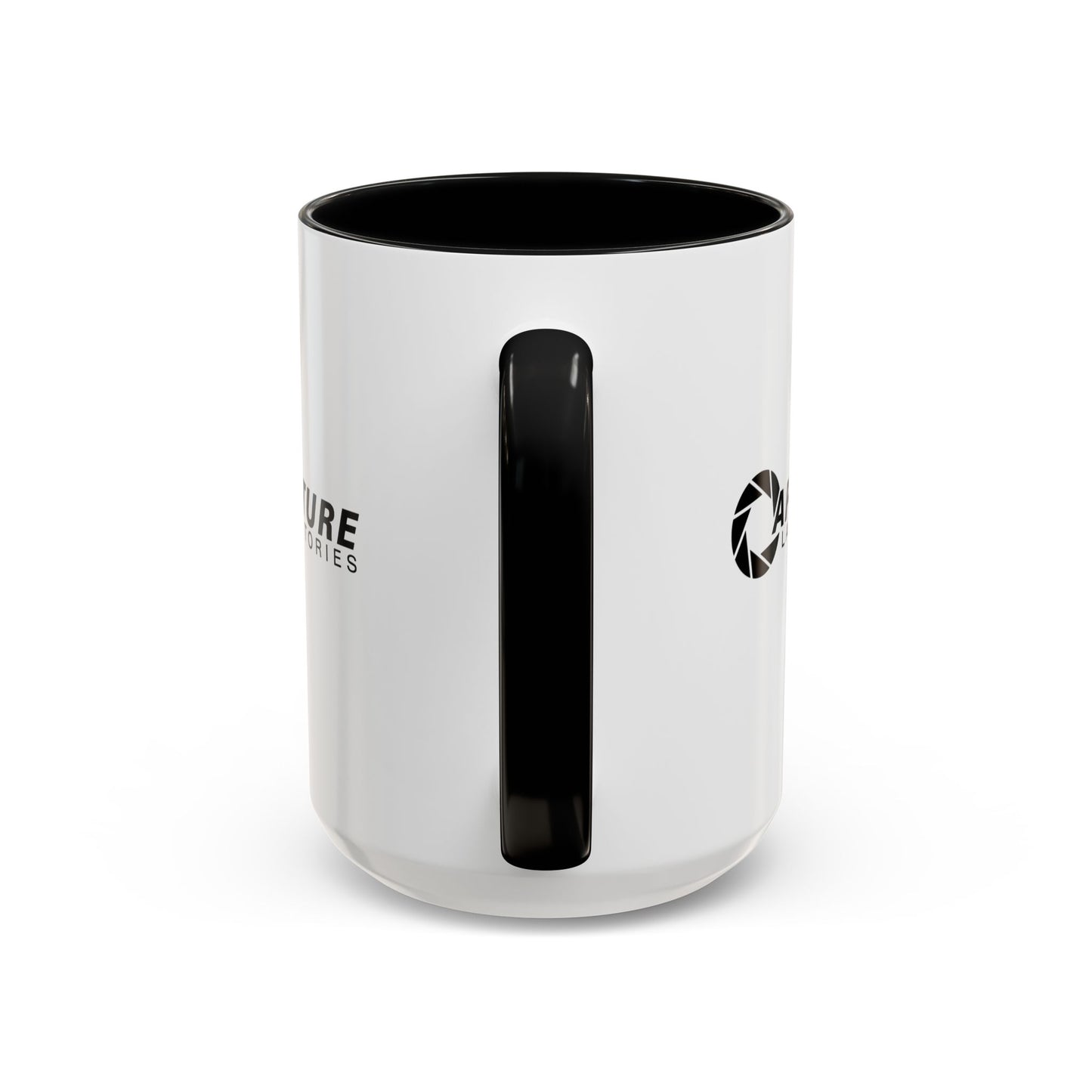 Side handle view of a 15 oz white Ceramic Accent Mug with the black Aperture Laboratories logo from the video game Portal on both sides. Handle and interior are colored black.