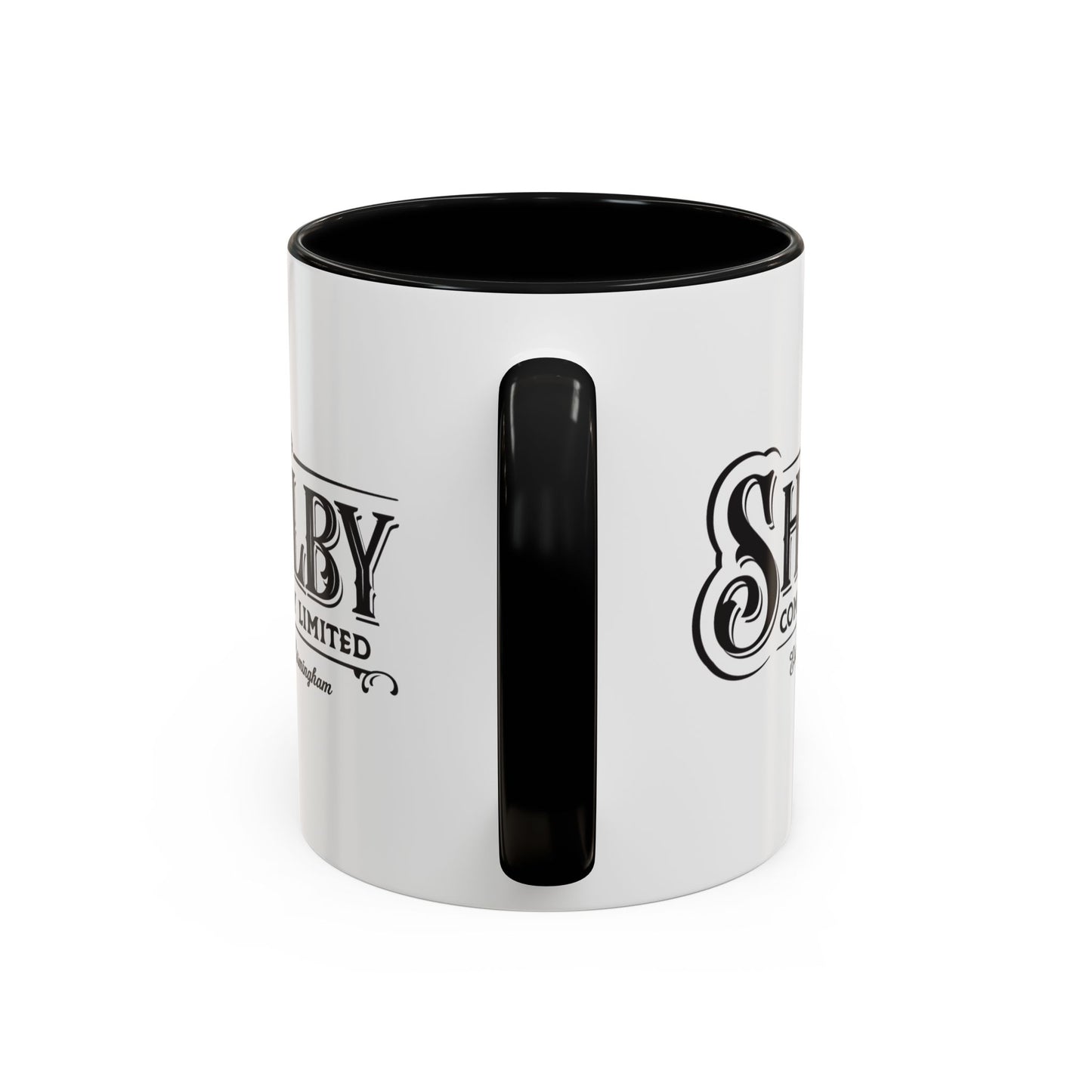 Handle-side view of a 11 oz White Ceramic Mug with black handle/interior featuring the fictional Shelby Company Limited Logo from the TV show Peaky Blinders printed on both sides. Black handle is on the right. Graphic is designed by ScriptedBrand and includes the text "Est. 1919 Birmingham".