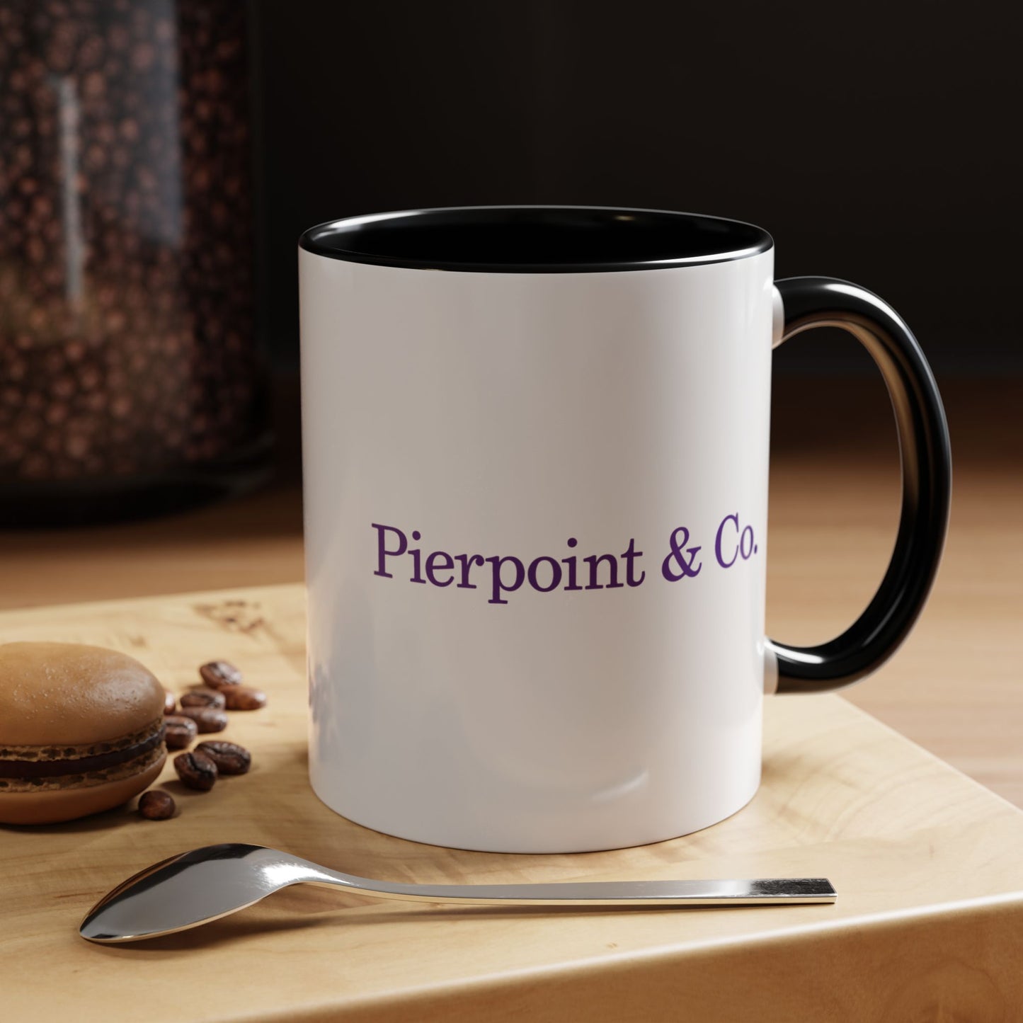 Kitchen image of a 11 oz White Ceramic Mug with black handle/interior featuring the purple Pierpoint & Co logo from the HBO TV show Industry printed on both sides, sold by ScriptedBrand.