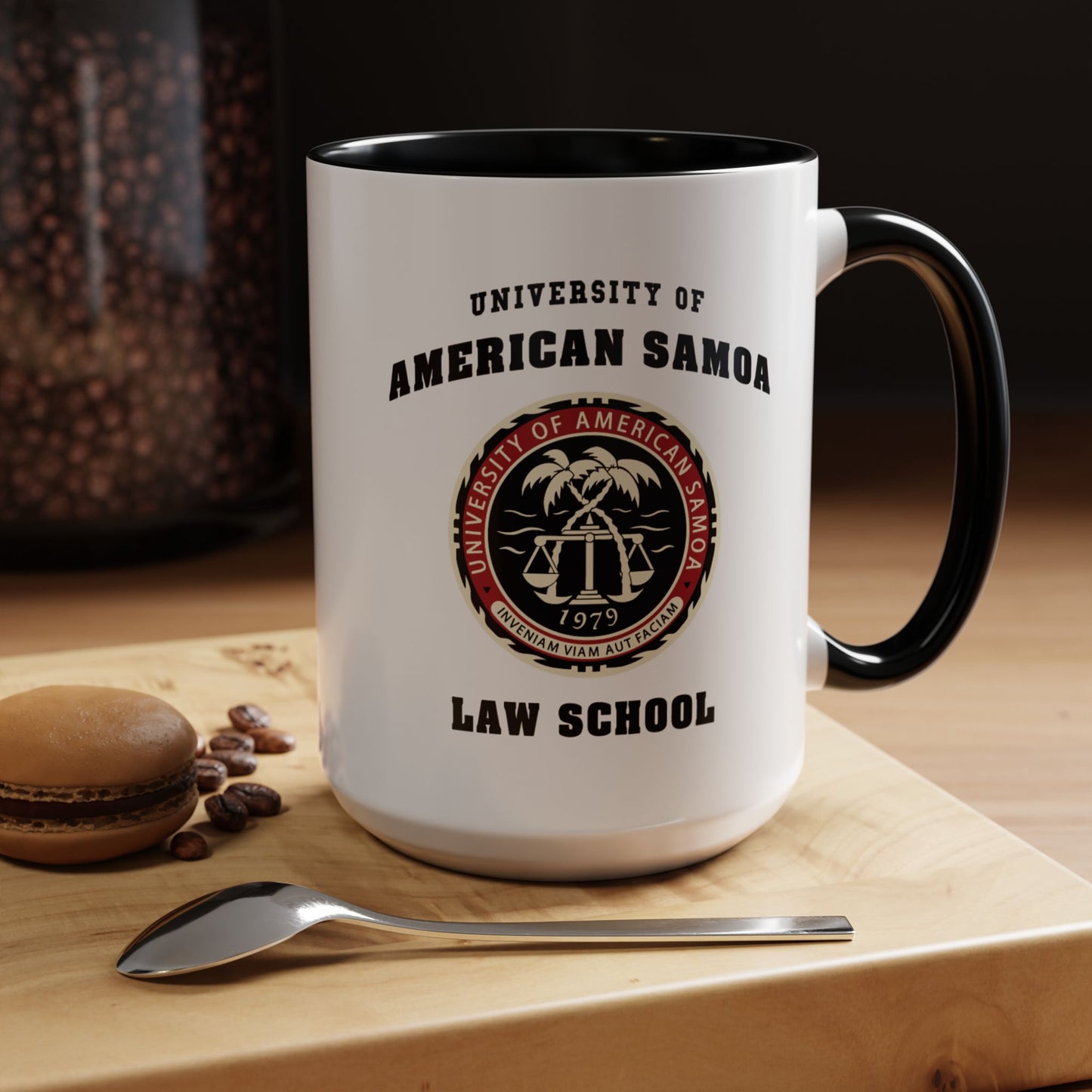 Kitchen view of 15 oz Ceramic mug with black handle featuring University of American Samoa Law School logo from Better Call Saul on both sides.