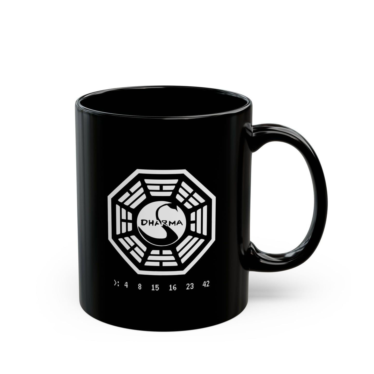 Mockup view of 11 oz Black Ceramic Mug on a desk featuring the Dharma Initiative swan station logo from the TV show LOST, including the Hatch numbers 4 8 15 16 23 42. Graphic is printed white on both sides.