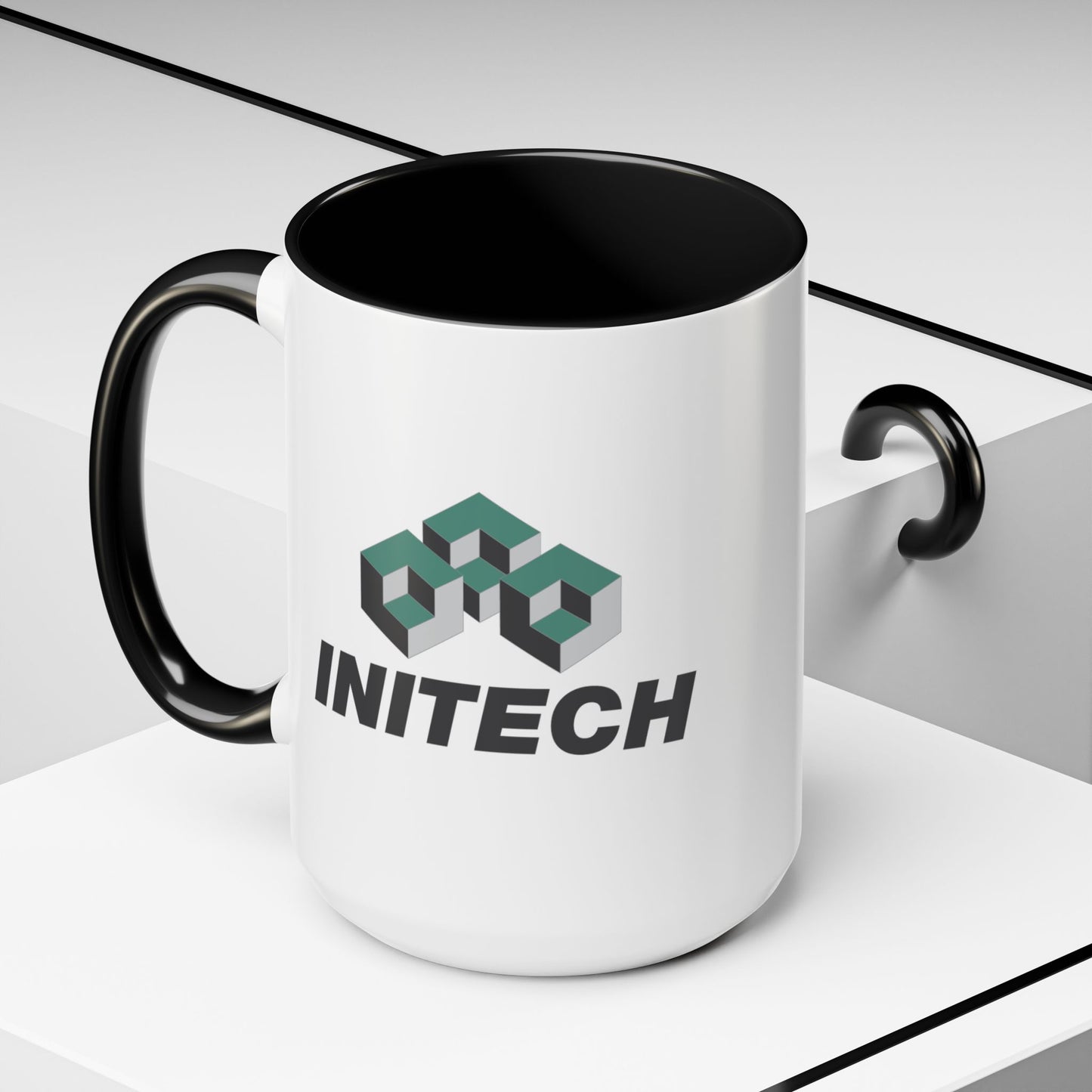 Angled view of a 15oz White Ceramic Accent Mug with black handle/interior featuring the fictional Initech logo from the movie Office Space printed on both sides, sold by ScriptedBrand.