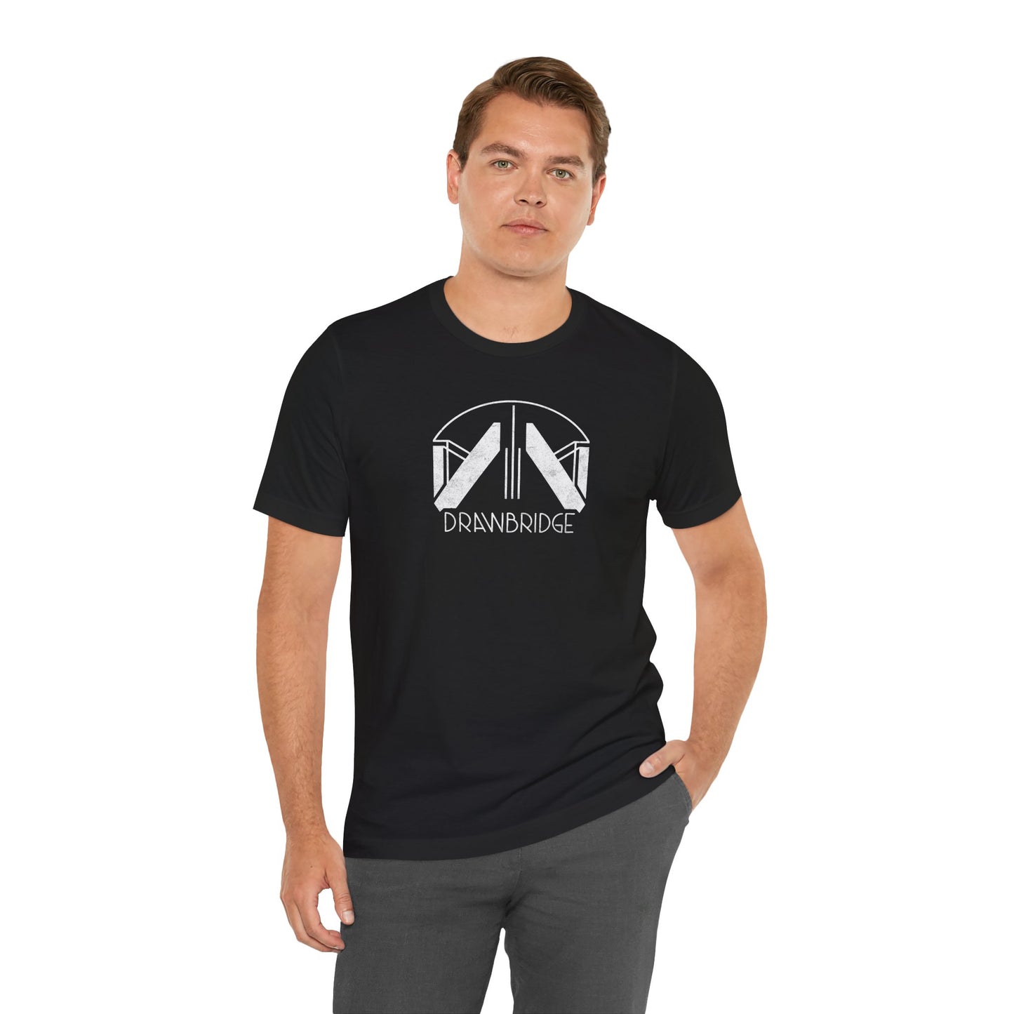Male model wearing a black colored soft Bella+Canvas 3001 short-sleeve t-shirt featuring the distressed Drawbridge logo from the video game Death Stranding 2, sold by ScriptedBrand.