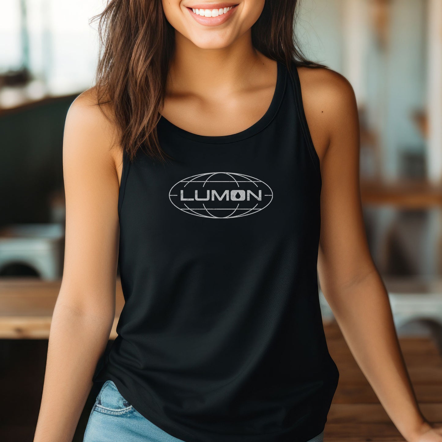Female model wearing a black colored Women's Racerback Tank Top Shirt featuring the Lumon Industries logo from the Apple TV show Severance in a vintage distressed style, sold by ScriptedBrand.