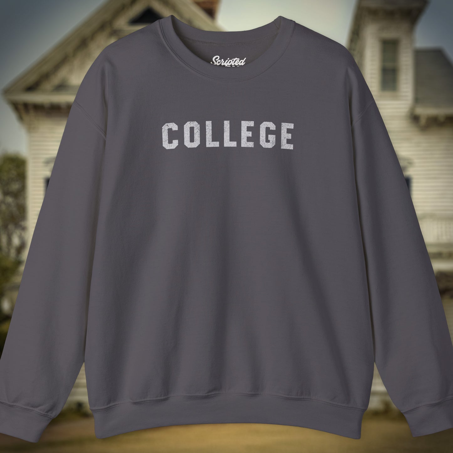 Front view of a charcoal gray colored soft unisex Gildan 18000 sweatshirt with the word COLLEGE that John Belushi wore in the movie Animal House, in a vintage distressed ink-stamped worn-in style, sold by ScriptedBrand.