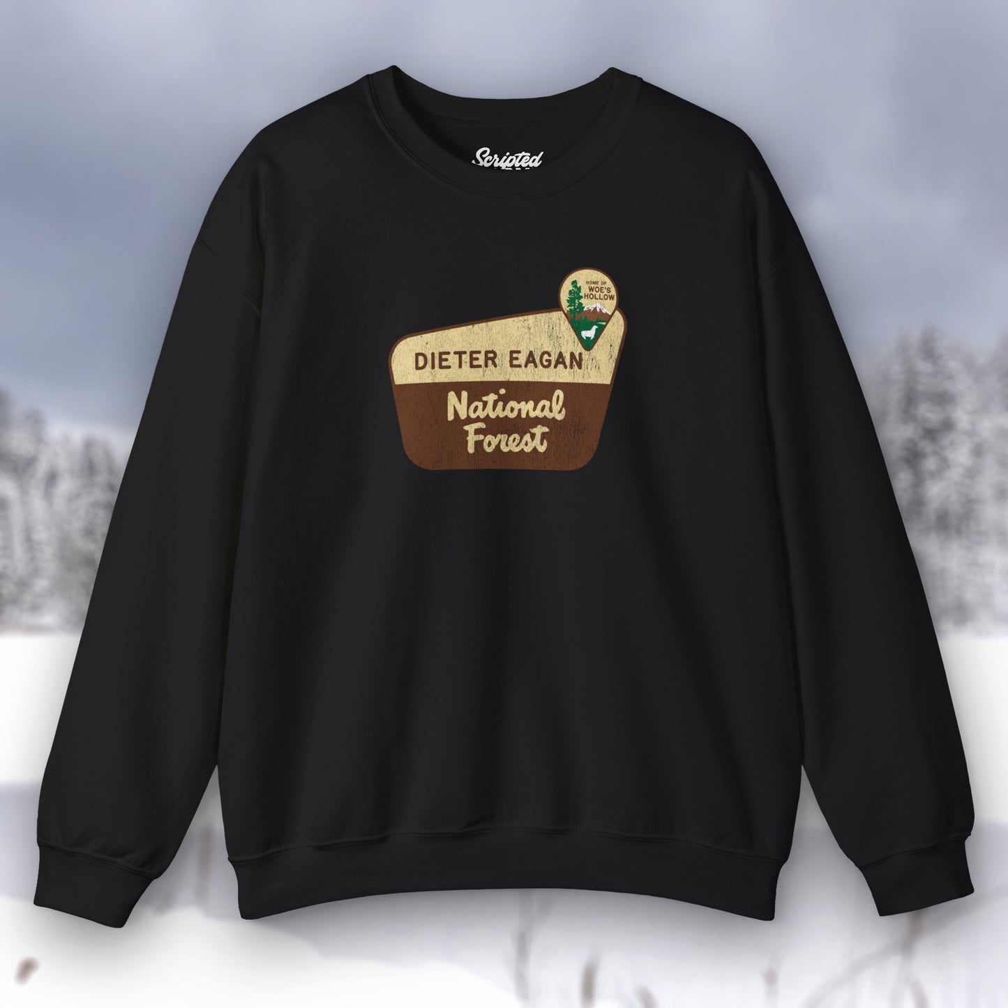 Front view of a black Soft Unisex Gildan 18000 sweatshirt featuring a logo graphic of the Dieter Eagan National Forest sign designed by ScriptedBrand, inspired by the TV show Severance in a vintage distressed style.