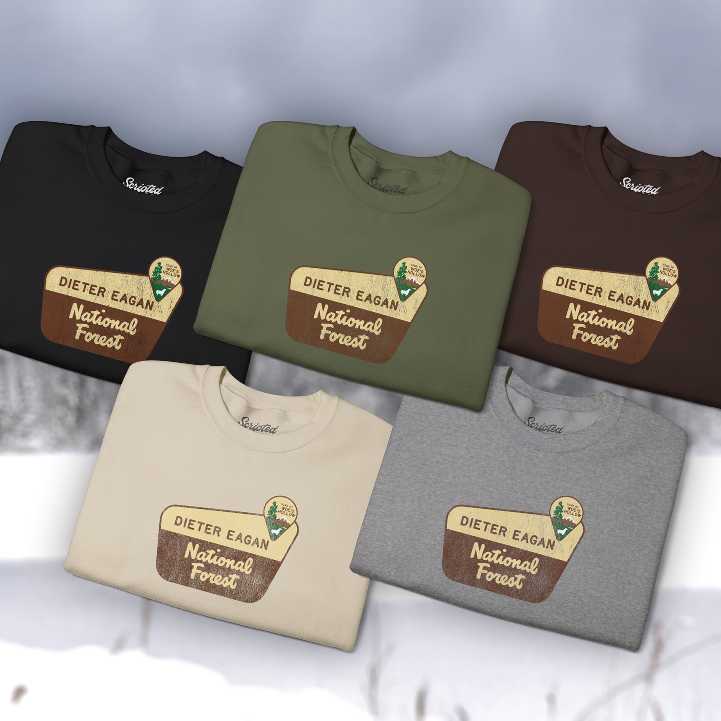 Group of 5 folded Soft Unisex Gildan 18000 sweatshirts featuring a logo graphic of the Dieter Eagan National Forest sign designed by ScriptedBrand, inspired by the TV show Severance in a vintage distressed style.