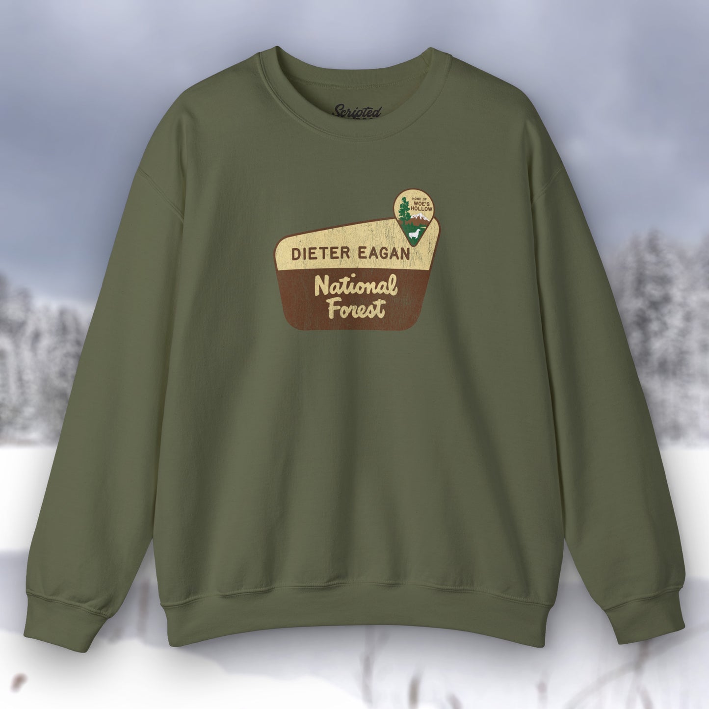 Front view of a military green Soft Unisex Gildan 18000 sweatshirt featuring a logo graphic of the Dieter Eagan National Forest sign designed by ScriptedBrand, inspired by the TV show Severance in a vintage distressed style.