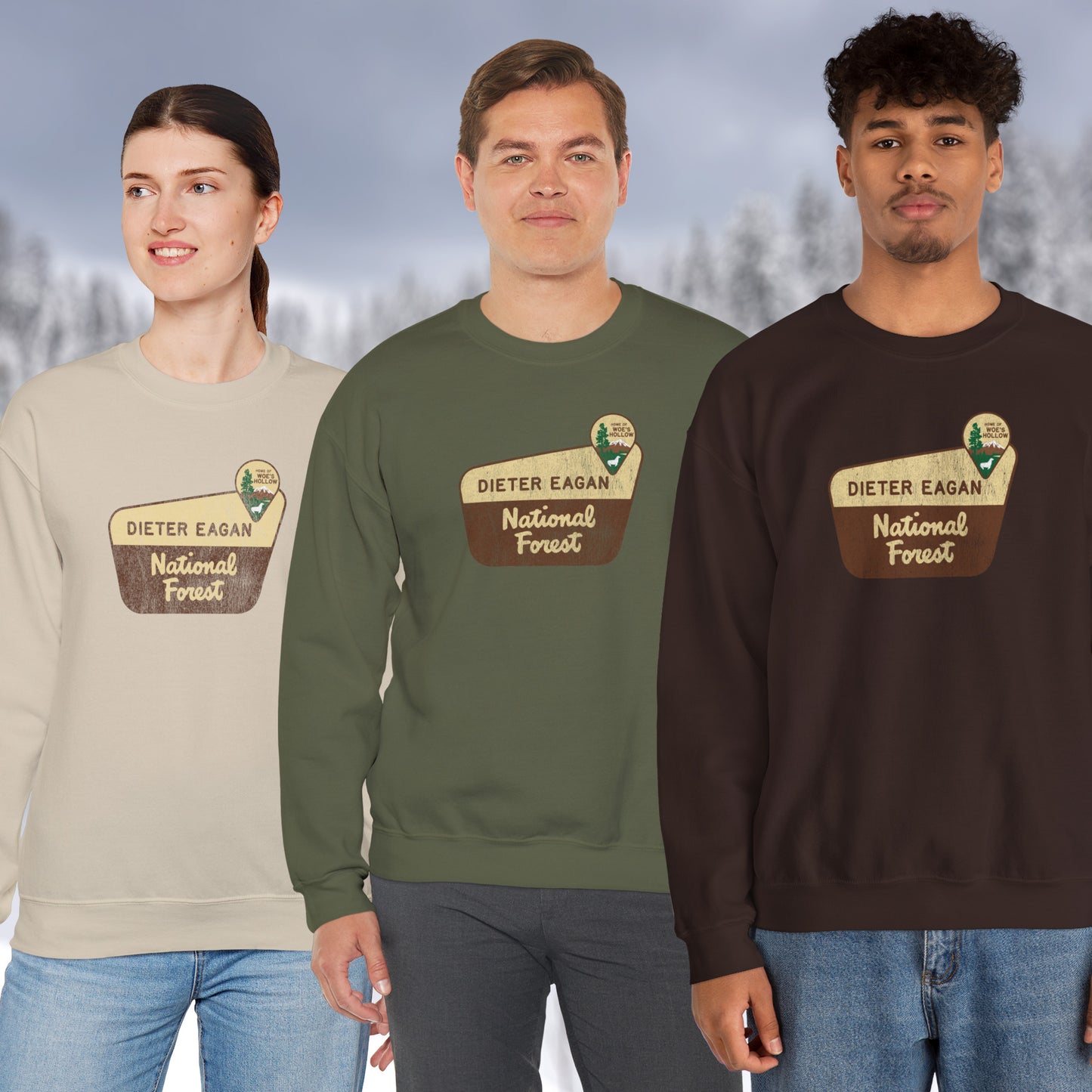 3 Models wearing Soft Unisex Gildan 18000 sweatshirts featuring a logo graphic of the Dieter Eagan National Forest sign designed by ScriptedBrand, inspired by the TV show Severance in a vintage distressed style.