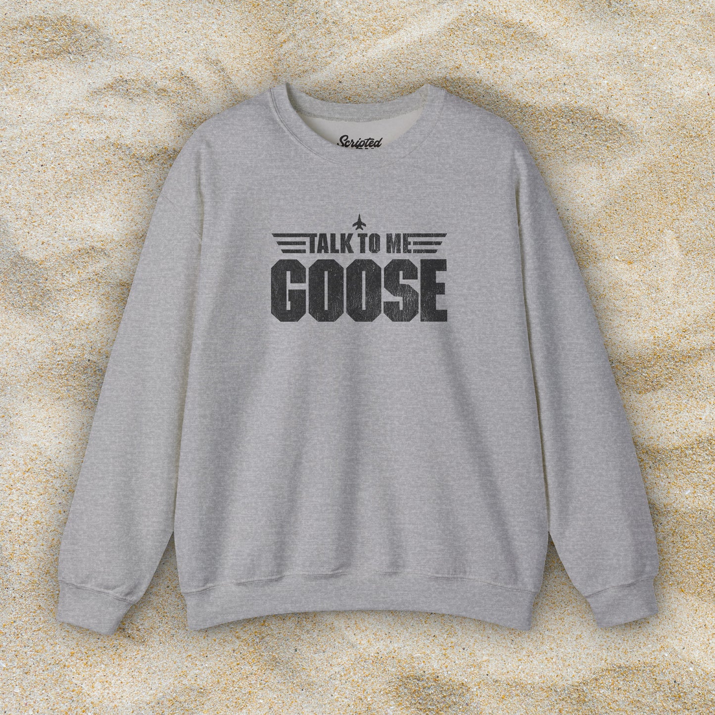 Front view of heather grey crewneck sweatshirt with distressed “Talk to Me Goose” graphic, inspired by the movie Top Gun.