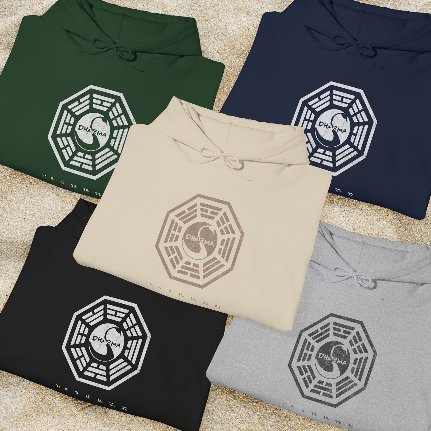 Group of 5 folded Soft Unisex Hoodie Heavy Blend Hooded Sweatshirts featuring the Dharma Initiative swan logo graphic from the TV show LOST in a vintage distressed ink-stamped worn-in style.