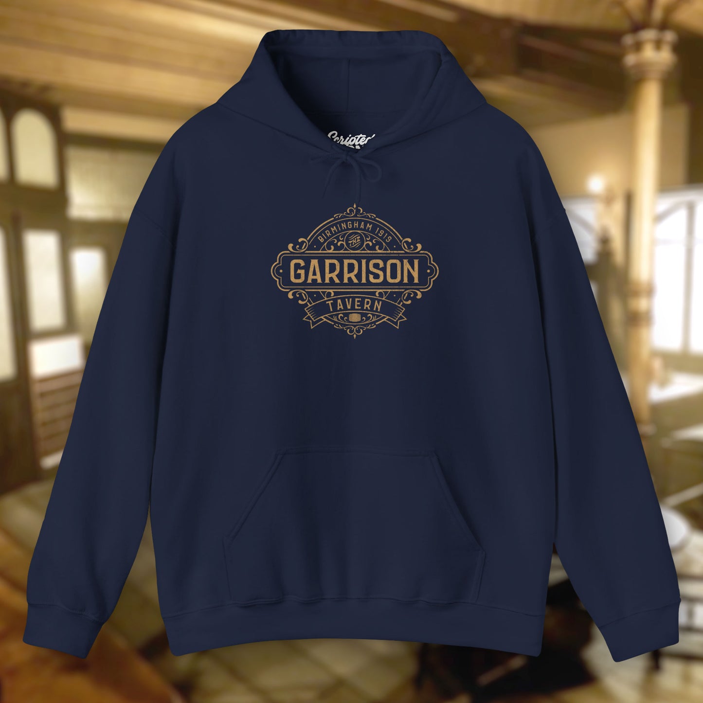 Front view of a navy blue Soft Unisex Hoodie Heavy Blend Hooded Sweatshirts featuring the Garrison Tavern Bar Logo Graphic inspired by the TV show and movie Peaky Blinders in a vintage distressed style sold by ScriptedBrand.