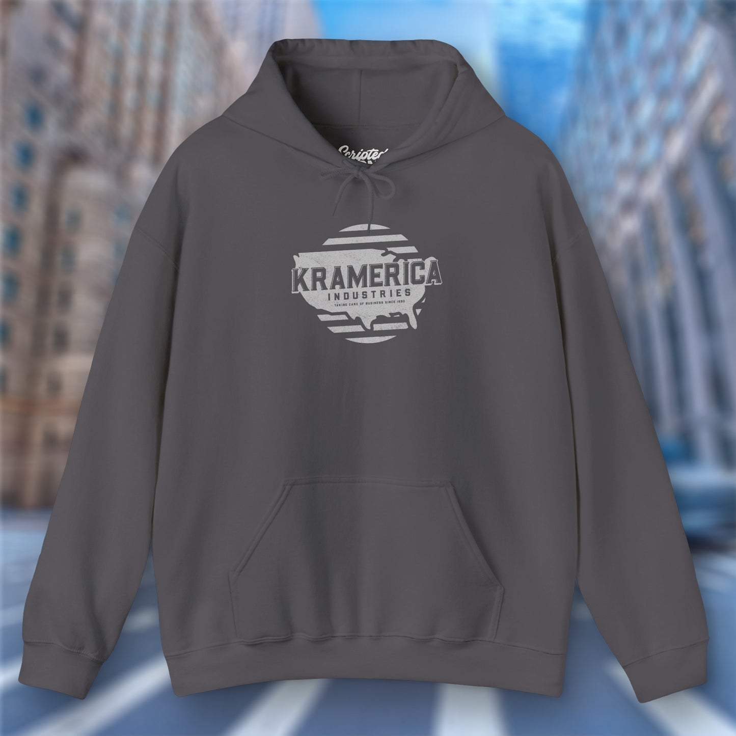 Asphalt Gray Hoodie Sweatshirt featuring a Kramerica logo inspired by Seinfeld, designed by ScriptedBrand in a vintage distressed style.