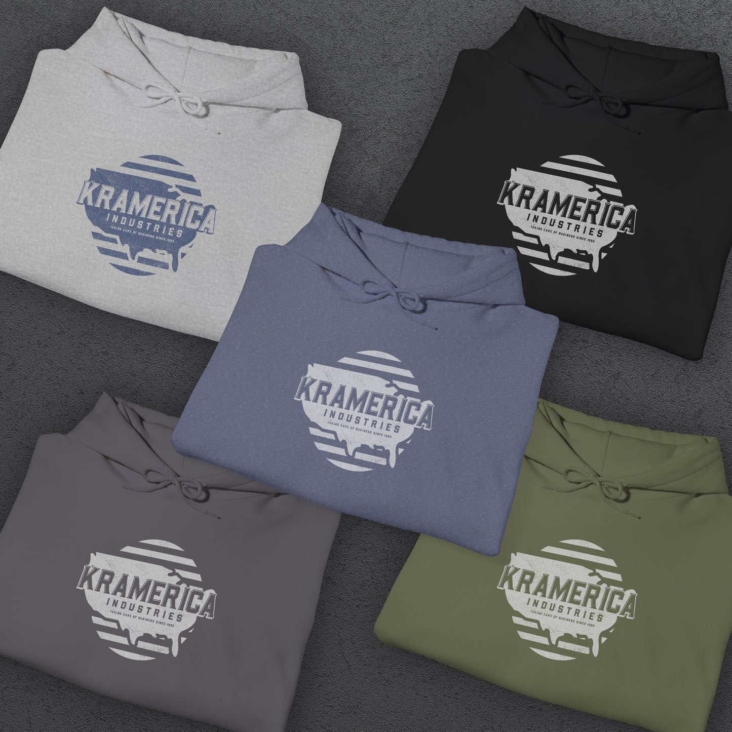 Five folded Hoodie Sweatshirts featuring a Kramerica logo inspired by Seinfeld, designed by ScriptedBrand in a vintage distressed style.