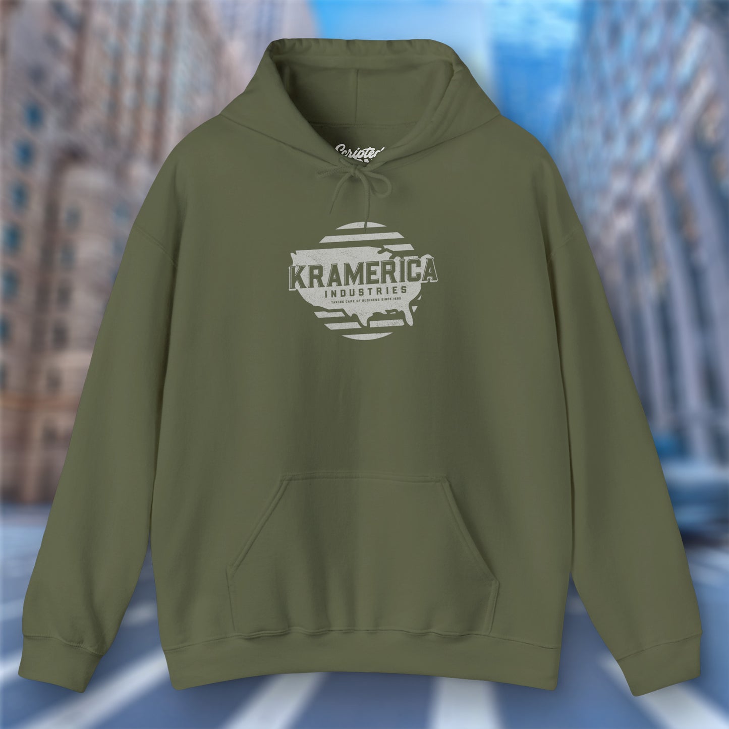 Military Green Hoodie Sweatshirt featuring a Kramerica logo inspired by Seinfeld, designed by ScriptedBrand in a vintage distressed style.