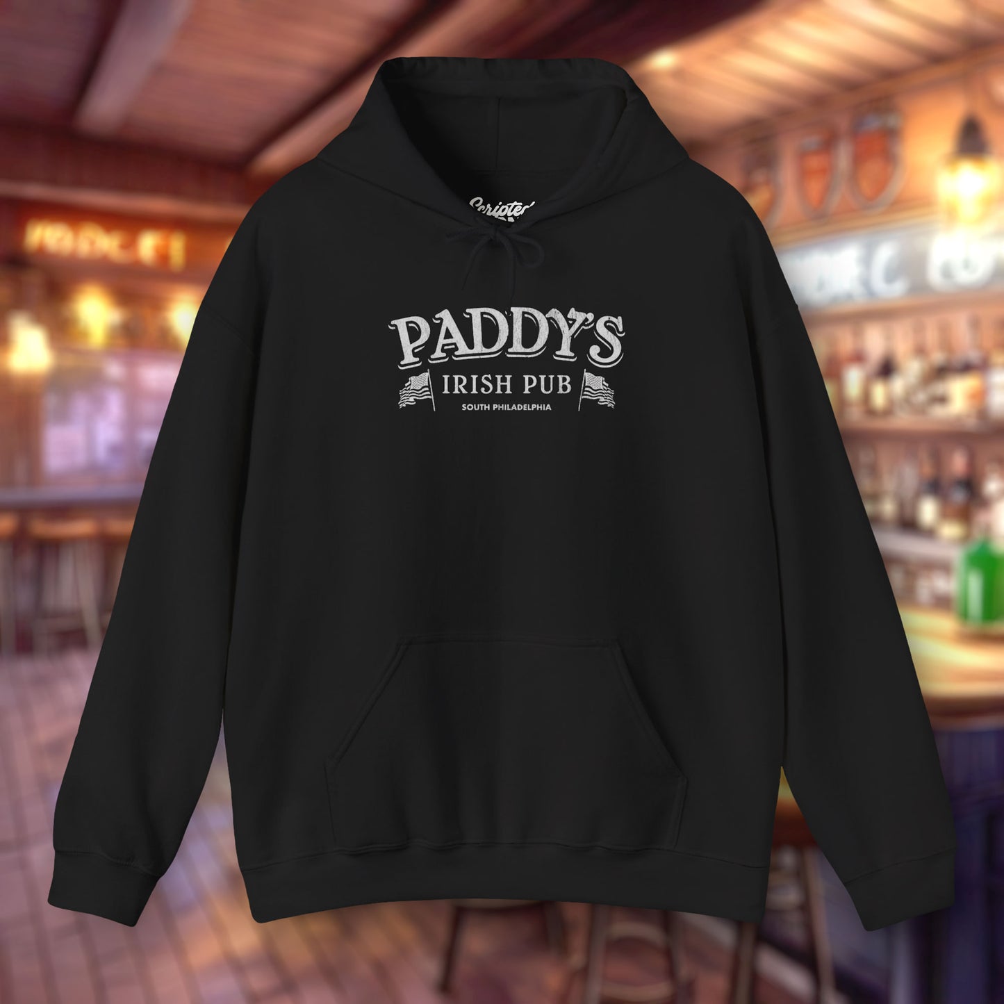 Front view of a black colored soft unisex Hoodie Heavy Blend Hooded Sweatshirt featuring the Paddy's Pub logo graphic from the TV Show It's Always Sunny in Philadelphia, in a vintage distressed style, sold by ScriptedBrand.
