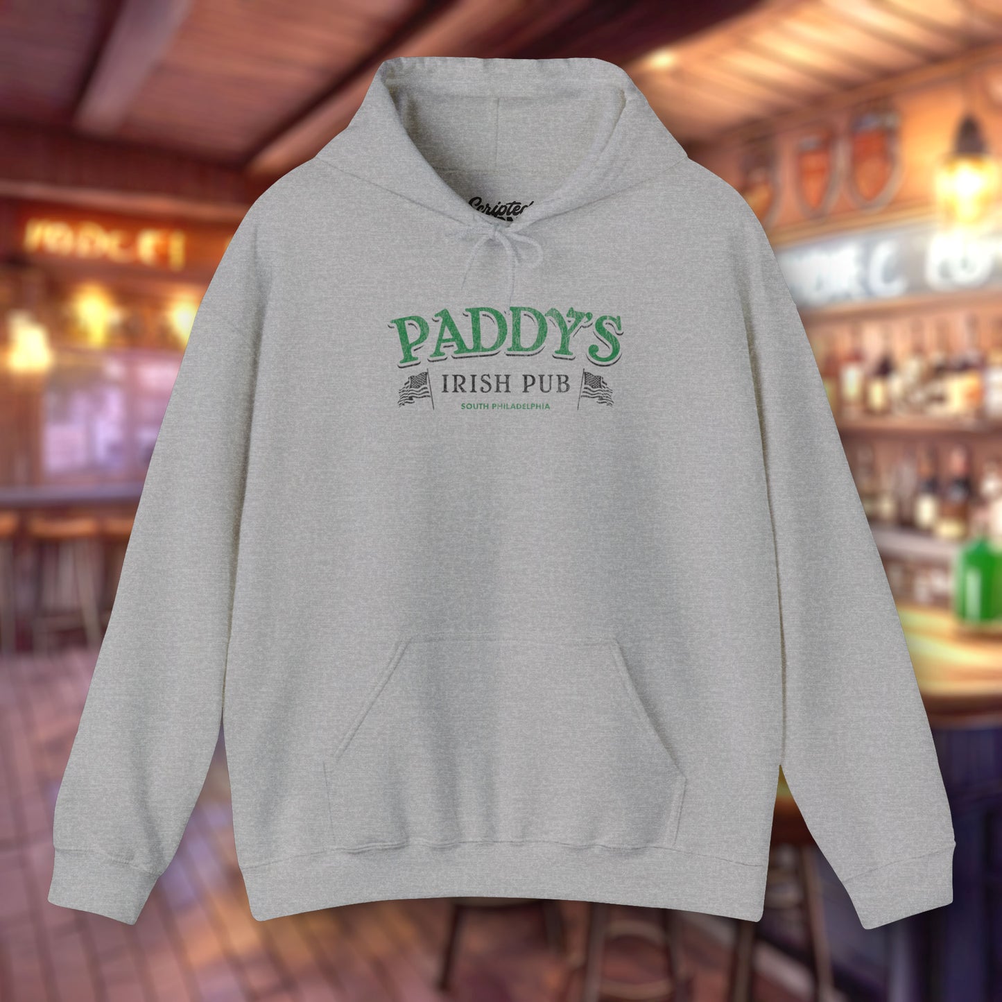 Front view of a sport heather grey colored soft unisex Hoodie Heavy Blend Hooded Sweatshirt featuring the green Paddy's Pub logo graphic from the TV Show It's Always Sunny in Philadelphia, in a vintage distressed style, sold by ScriptedBrand.