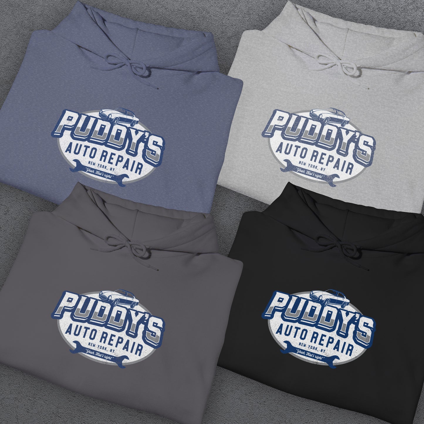 Group of 4 folded soft Unisex Hoodie Heavy Blend Hooded Sweatshirts featuring a Puddy's Auto Repair graphic designed by ScriptedBrand inspired by the TV show Seinfeld in a vintage distressed style.