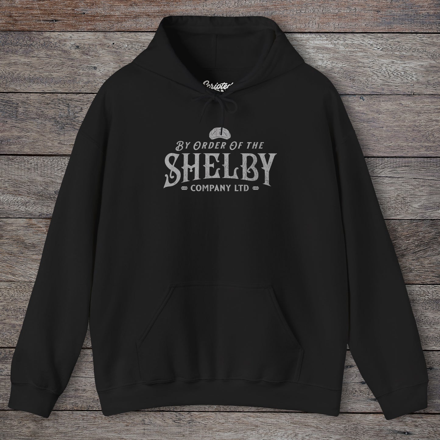 Front view of a black Shelby Company Ltd hoodie with vintage logo from Peaky Blinders, featuring flat cap and razor blades.