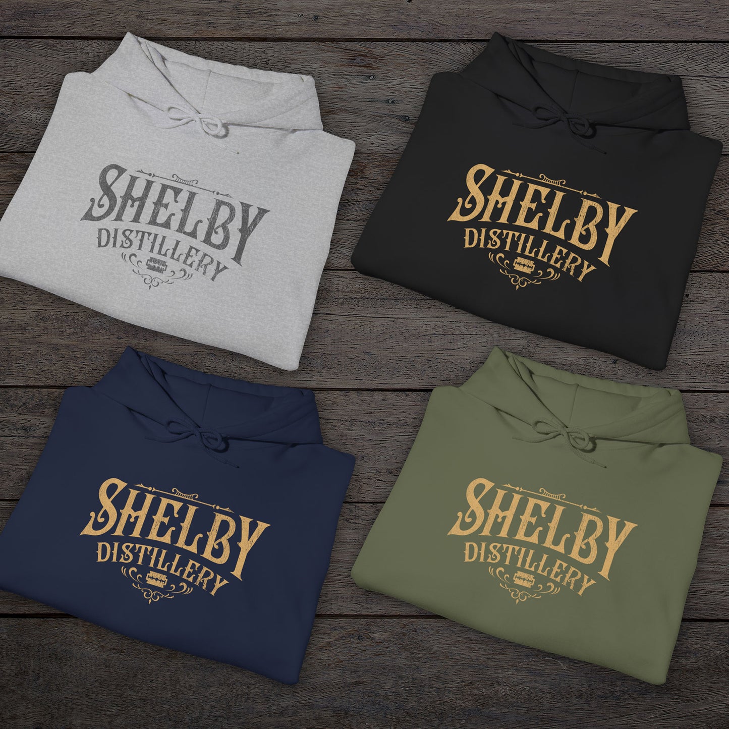Group of 4 folded Unisex Hoodie Heavy Blend Hooded Sweatshirts featuring the Shelby Company Limited Distillery Logo Graphic inspired by the TV show and movie Peaky Blinders in a vintage distressed ink-stamped worn-in style.