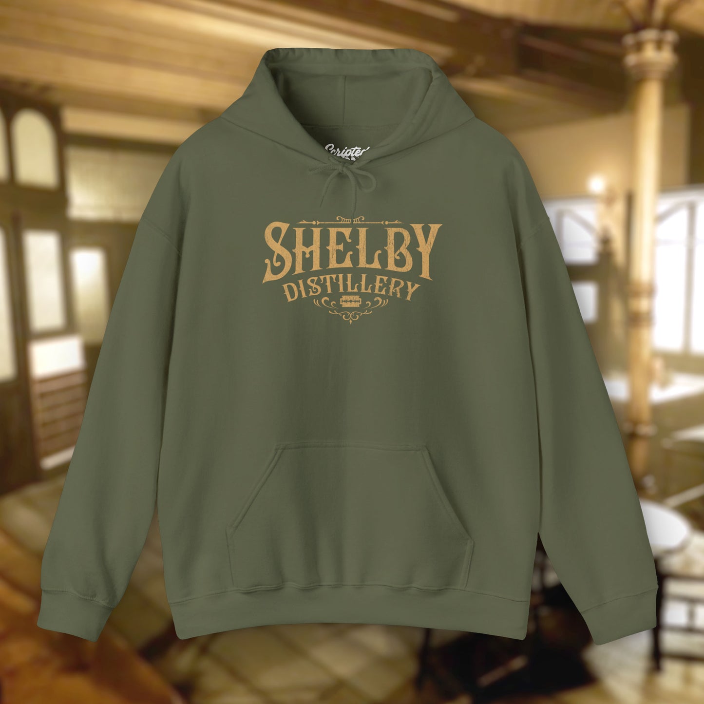 Military Green colored Unisex Hoodie Heavy Blend Hooded Sweatshirt featuring the Shelby Company Limited Distillery Logo Graphic inspired by the TV show and movie Peaky Blinders in a vintage distressed ink-stamped worn-in style.