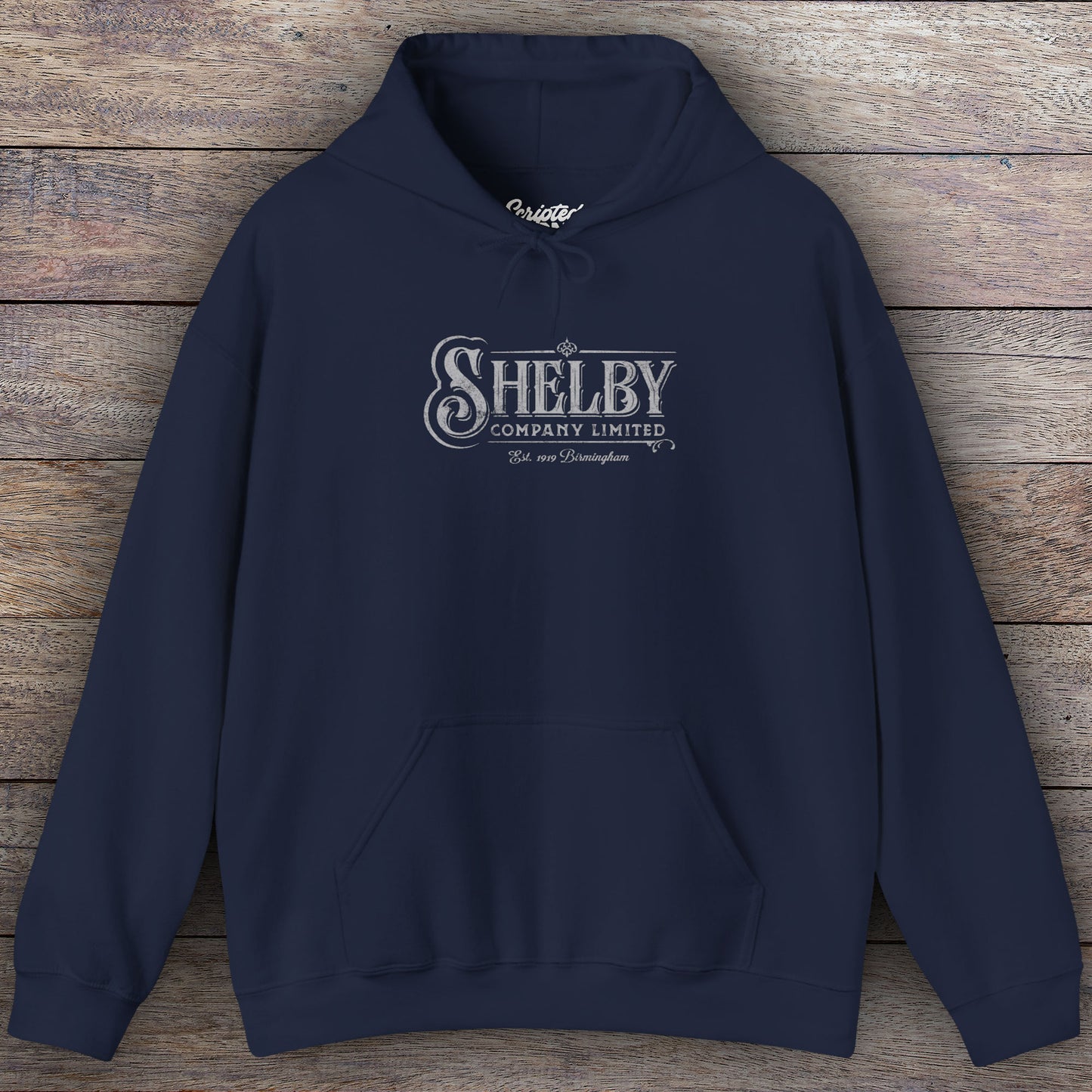Navy blue colored Soft Unisex Hoodie Heavy Blend Hooded Sweatshirt featuring the fictional logo Shelby Company Limited from the TV series Peaky Blinders in a vintage distressed style.