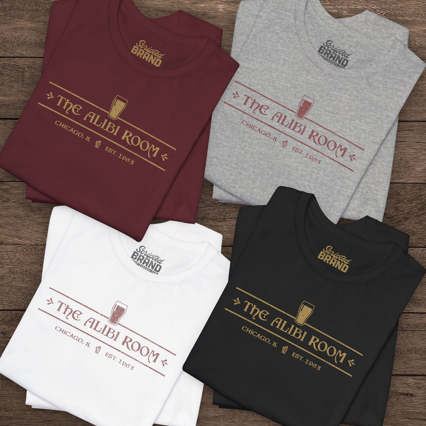 Group of folded t-shirts featuring The Alibi Room logo graphic inspired by the TV show Shameless in a vintage distressed style.