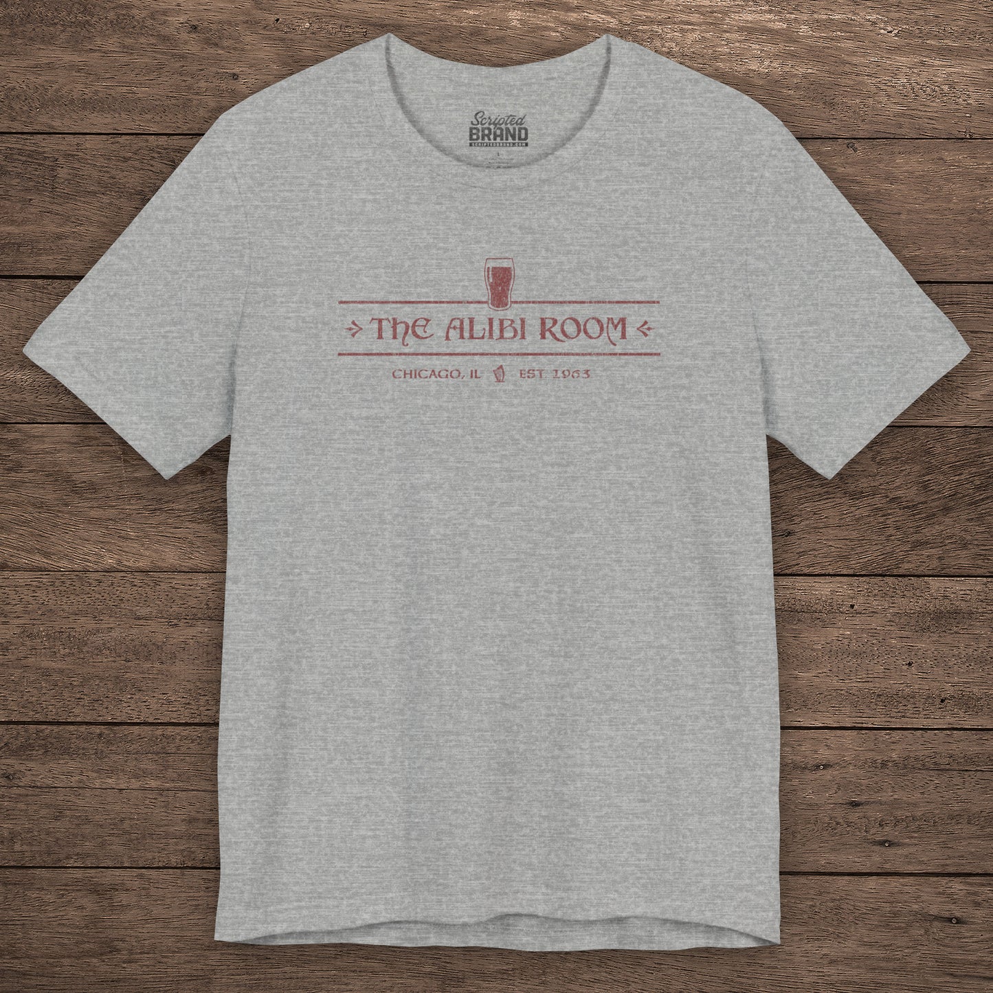 Athletic heather t-shirt featuring The Alibi Room logo graphic inspired by the TV show Shameless in a vintage distressed style.