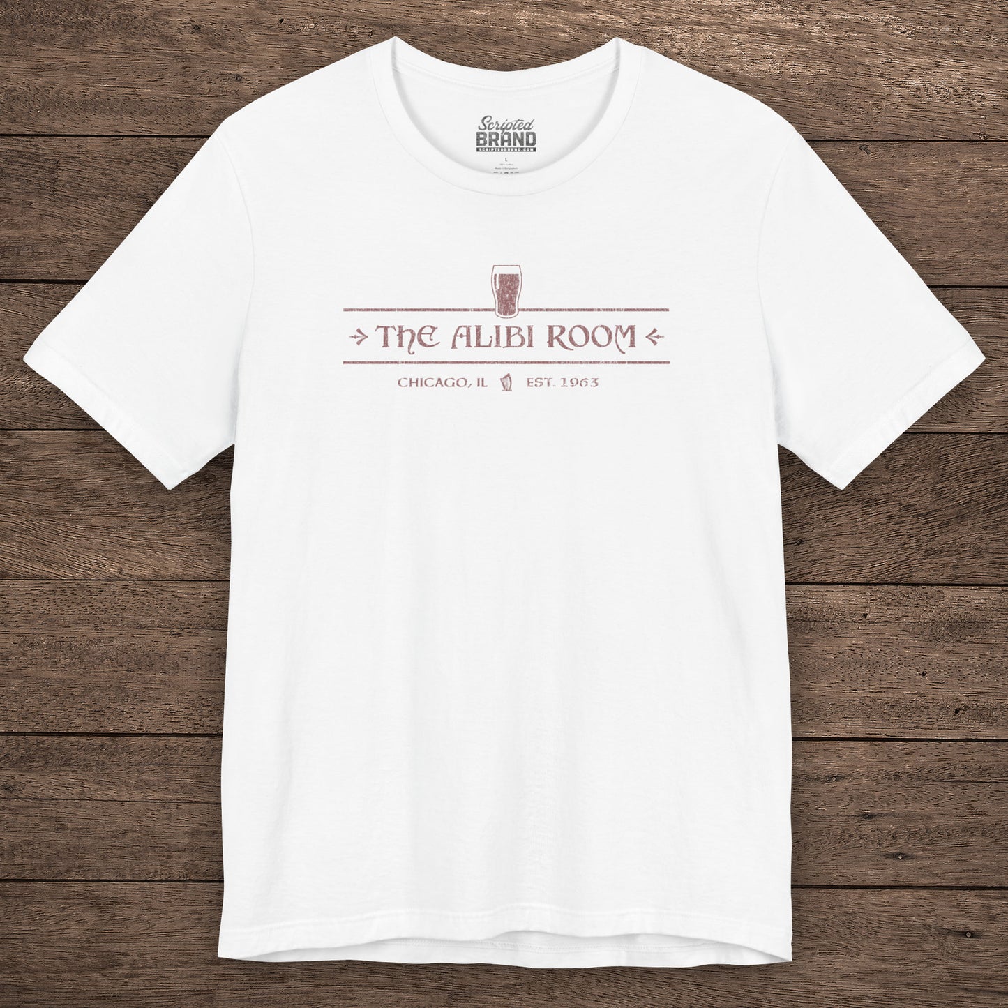 White t-shirt featuring The Alibi Room logo graphic inspired by the TV show Shameless in a vintage distressed style.