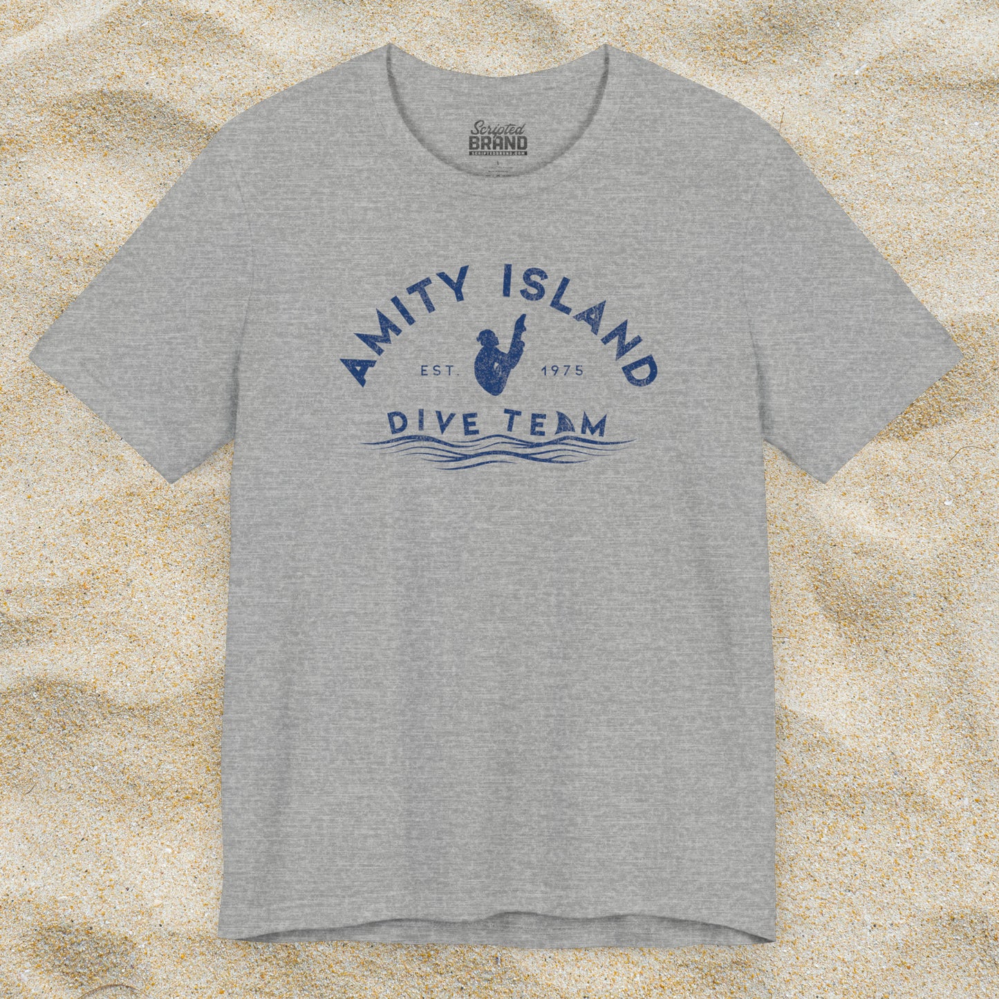 Front view of heather grey Bella+Canvas t-shirt with vintage-style Amity Island Dive Team logo, inspired by the movie Jaws.