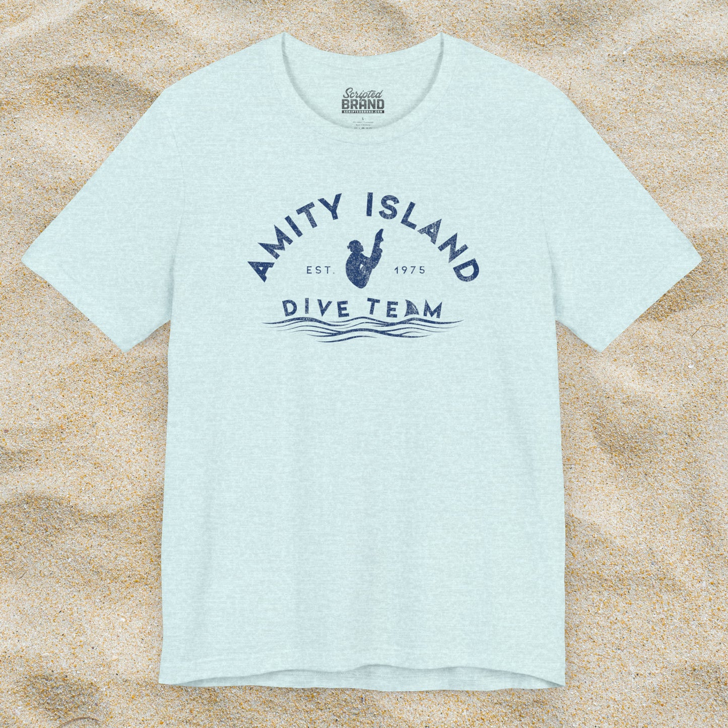 Front view of Heather Prism Ice Blue Bella+Canvas t-shirt with vintage-style Amity Island Dive Team logo, inspired by the movie Jaws.
