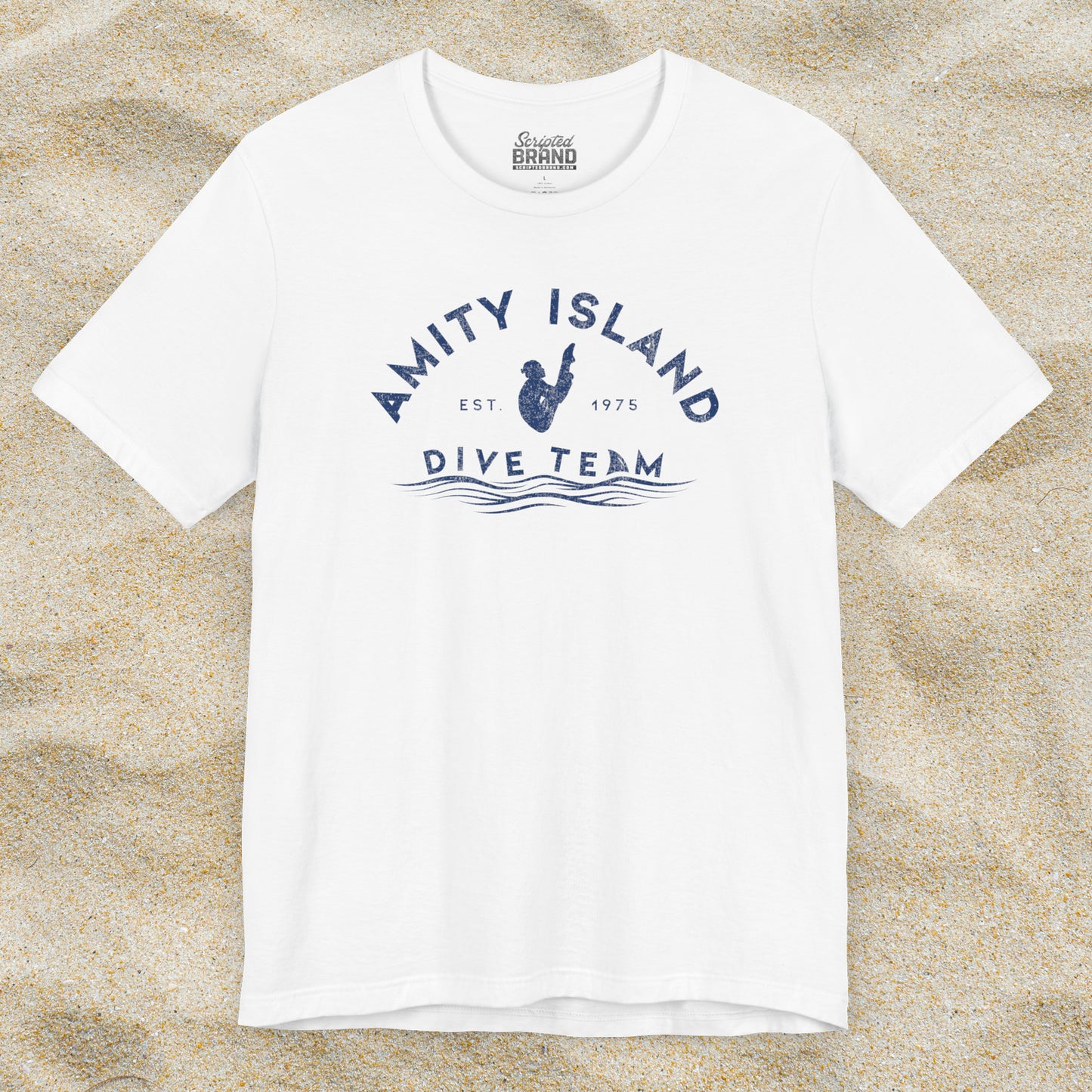 Front view of white Bella+Canvas t-shirt with vintage-style Amity Island Dive Team logo, inspired by the movie Jaws.