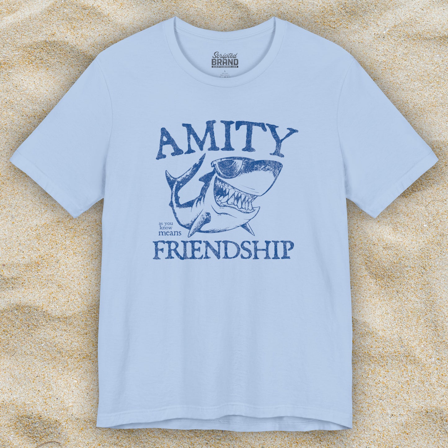 Baby Blue Bella+Canvas t-shirt with a vintage-style Amity Island “Friendship” shark graphic inspired by the movie Jaws