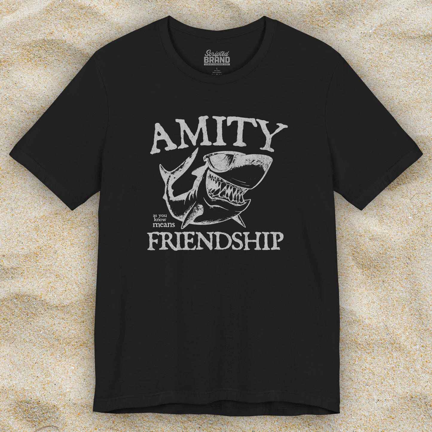 Black Bella+Canvas t-shirt with a vintage-style Amity Island “Friendship” shark graphic inspired by the movie Jaws