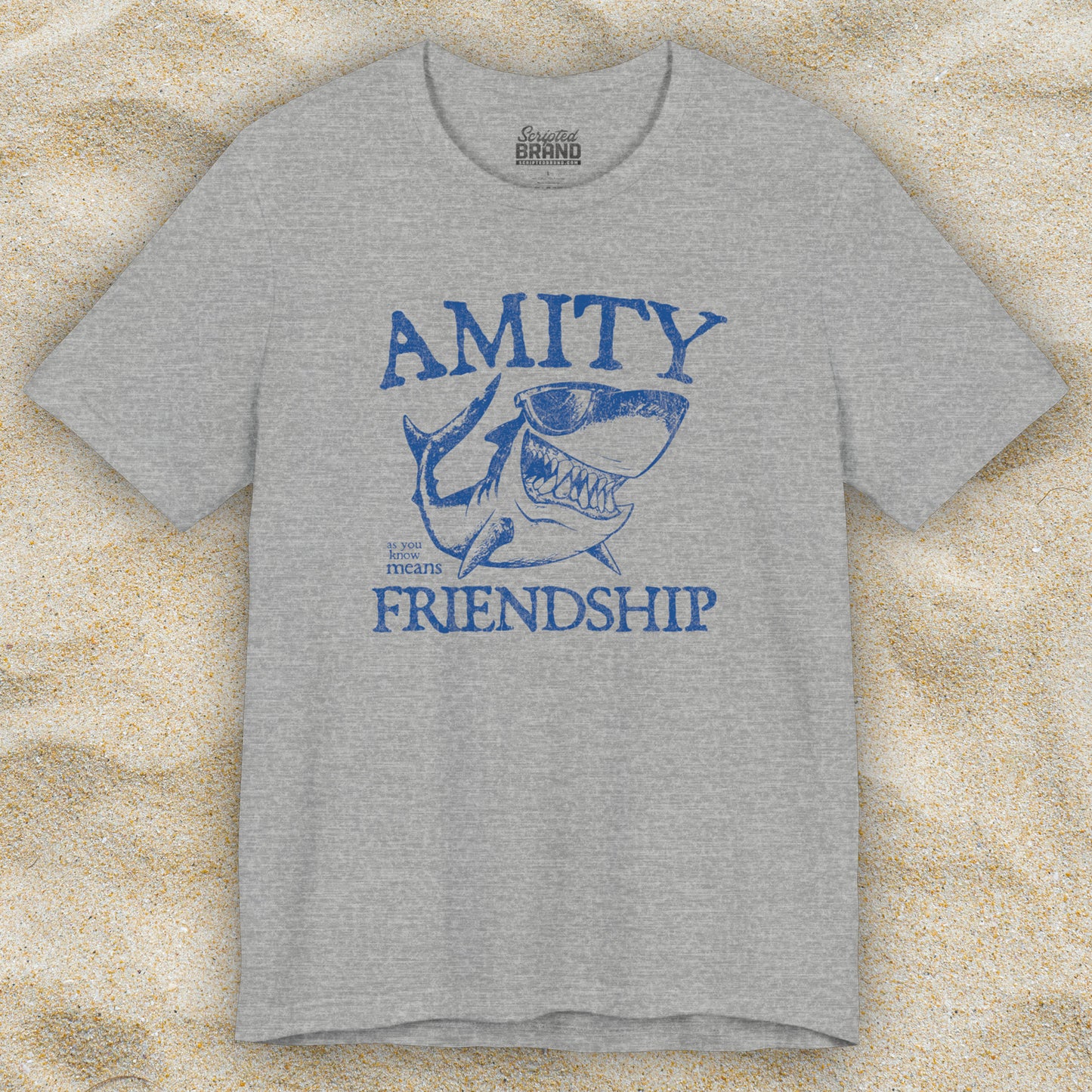 Athletic heather grey Bella+Canvas t-shirt with a vintage-style Amity Island “Friendship” shark graphic inspired by the movie Jaws