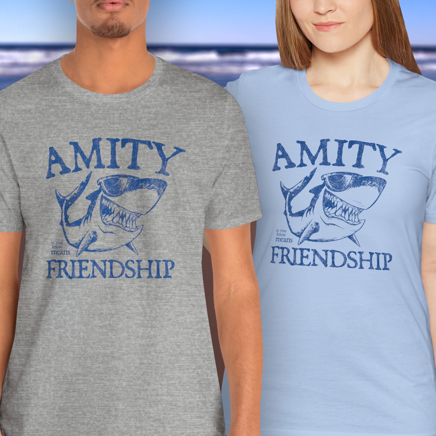 2 models wearing Bella+Canvas t-shirts with a vintage-style Amity Island “Friendship” shark graphic inspired by the movie Jaws