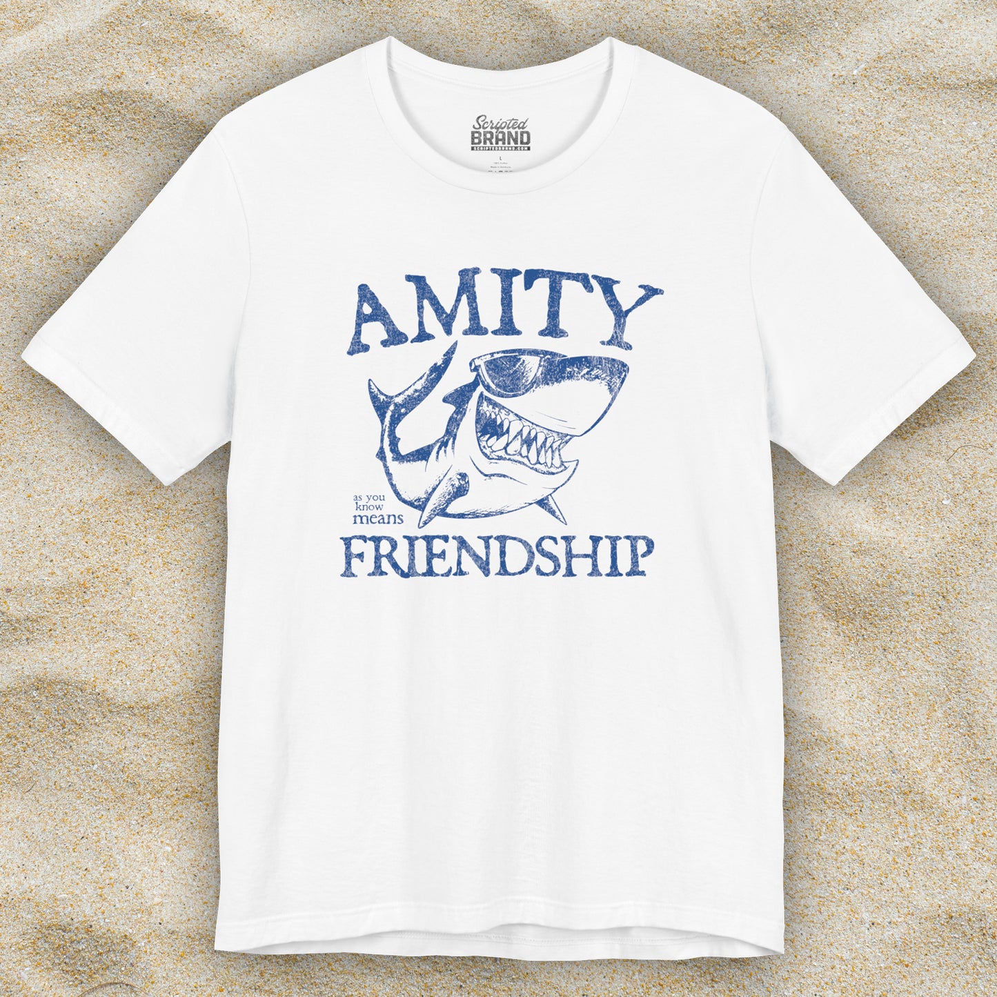 White Bella+Canvas t-shirt with a vintage-style Amity Island “Friendship” shark graphic inspired by the movie Jaws