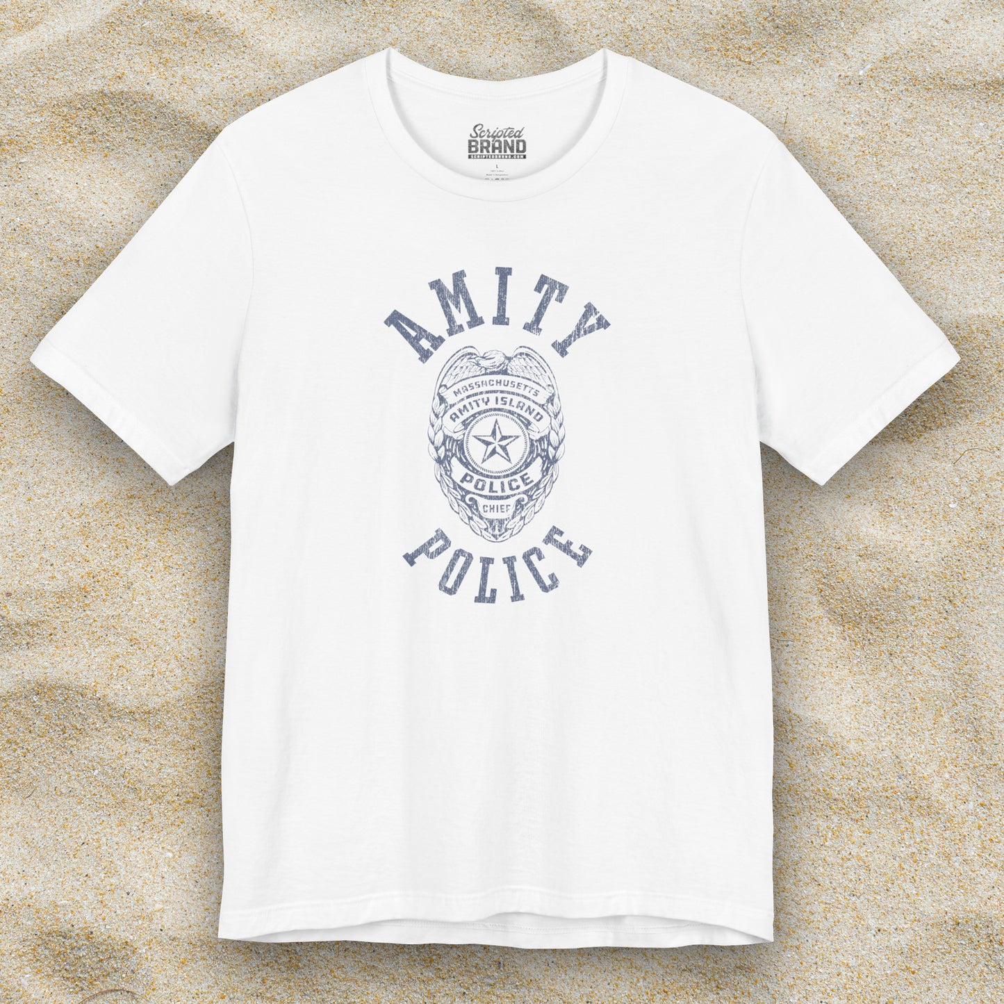 Front view of a white colored Soft unisex Bella+Canvas 3001 short-sleeve t-shirt featuring an Amity Island Police logo graphic, designed by ScriptedBrand, and inspired by the movie Jaws in a vintage distressed style.