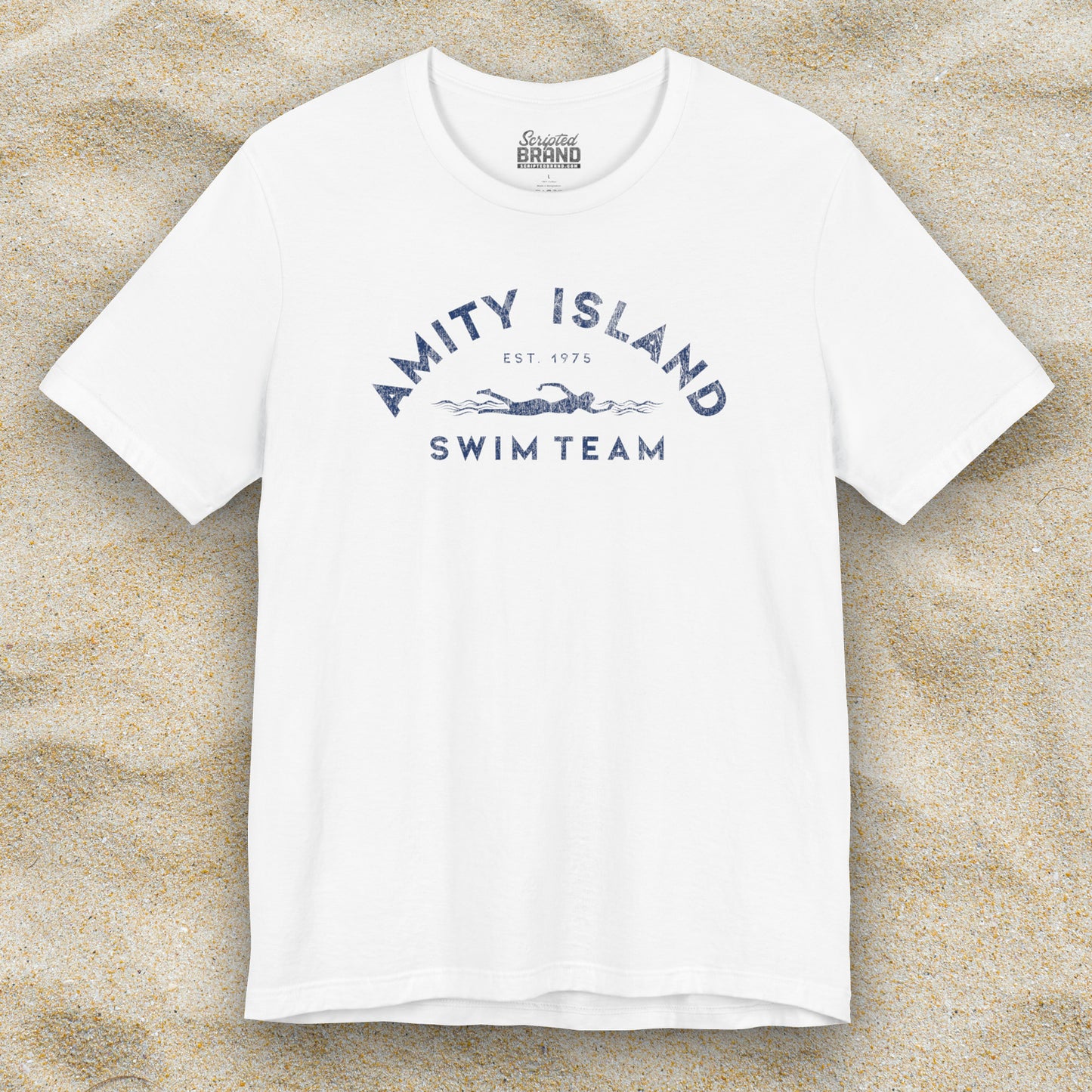 Front view of a white colored Soft unisex Bella+Canvas 3001 short-sleeve t-shirt featuring an Amity Island Swim Team logo graphic, designed by ScriptedBrand, and inspired by the movie Jaws in a vintage distressed style.