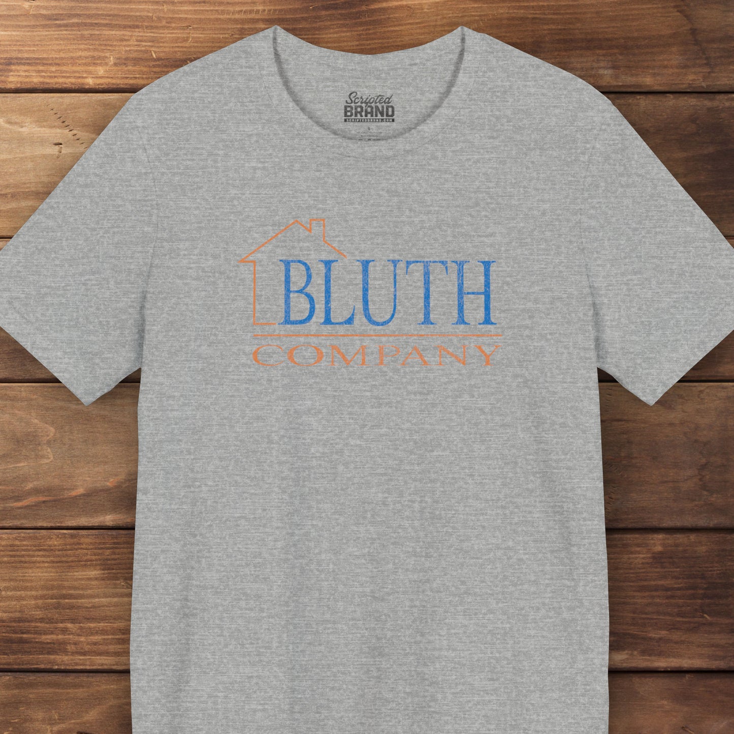 Front view of athletic grey Bella+Canvas t-shirt featuring a vintage Bluth Company logo inspired by the TV show Arrested Development.
