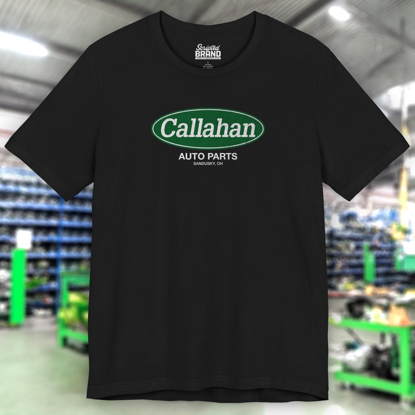 Front view of a Black colored soft short-sleeve t-shirt with the Callahan Auto Parts logo from the movie Tommy Boy in a vintage distressed style.