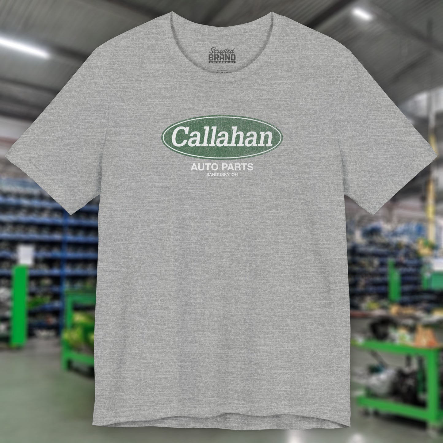Front view of a Athletic Heather Gray colored soft short-sleeve t-shirt with the Callahan Auto Parts logo from the movie Tommy Boy in a vintage distressed style.