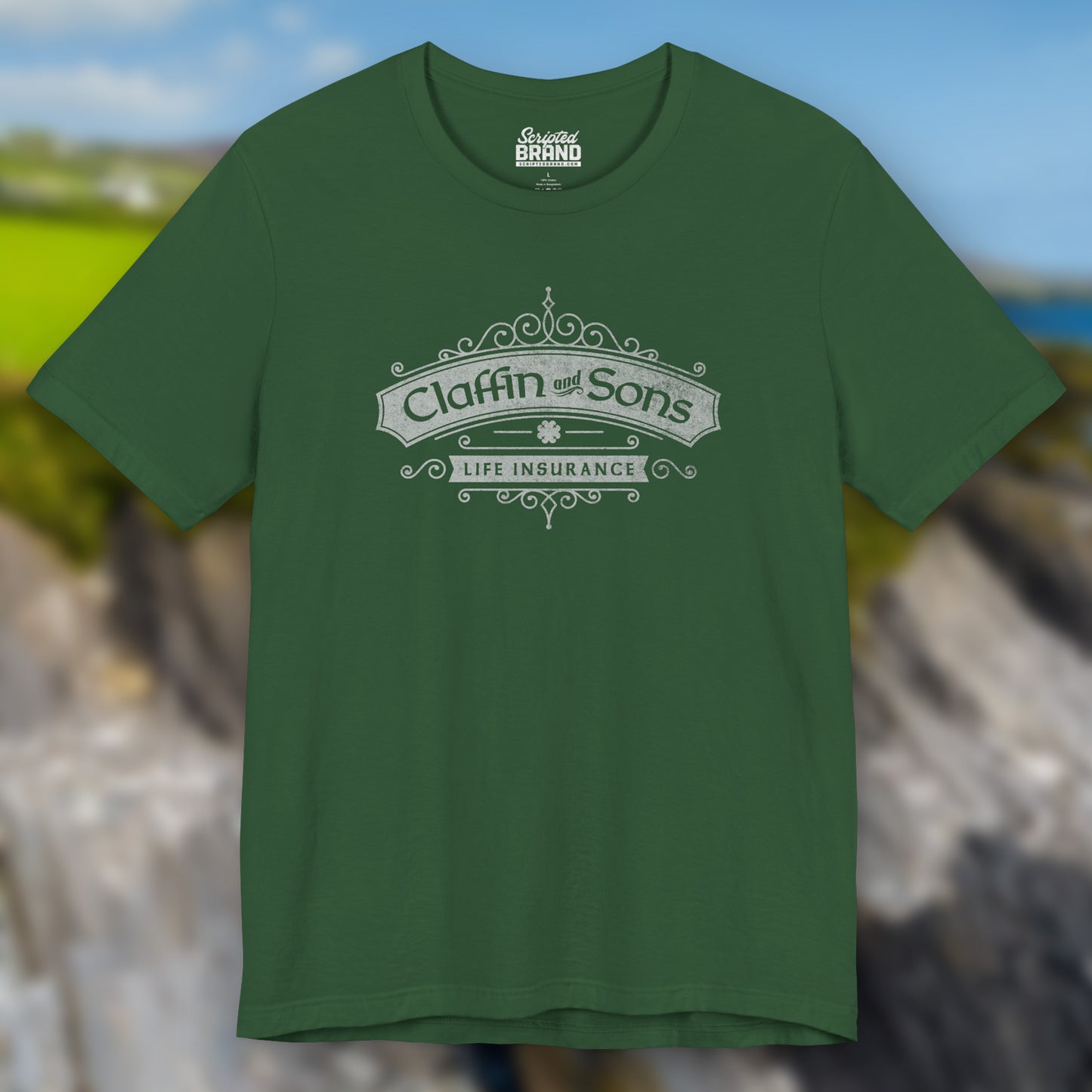 Front view of an evergreen colored soft Bella+Canvas 3001 short-sleeve t-shirt featuring a logo graphic of Claffin & Sons Insurance, designed by ScriptedBrand in a vintage distressed vintage distressed style, inspired by the TV show Bad Sisters.