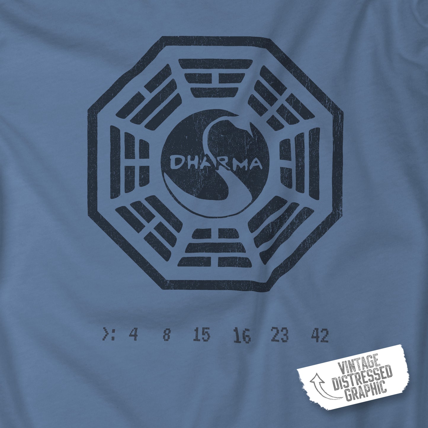 Closeup of Lavender blue short-sleeve t-shirt featuring the Dharma Initiative swan station logo graphic from the TV show LOST in a vintage distressed style.