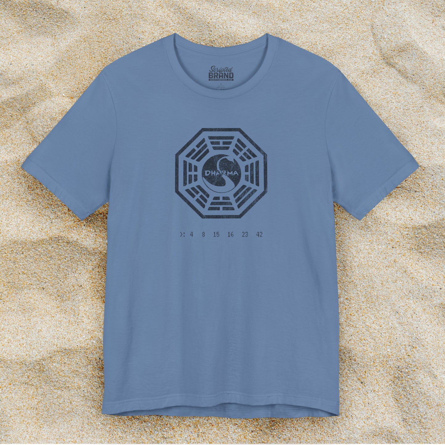 Lavender blue short-sleeve t-shirt featuring the Dharma Initiative swan station logo graphic from the TV show LOST in a vintage distressed style.
