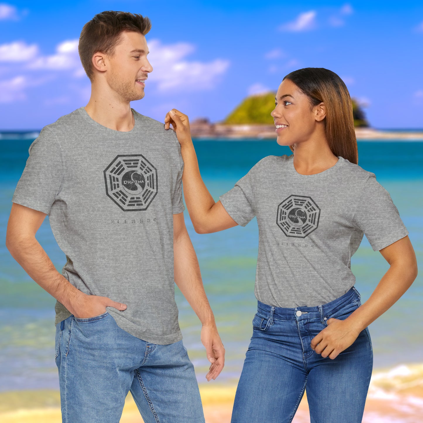 2 models wearing athletic heather gray short-sleeve t-shirts featuring the Dharma Initiative swan station logo graphic from the TV show LOST in a vintage distressed style.