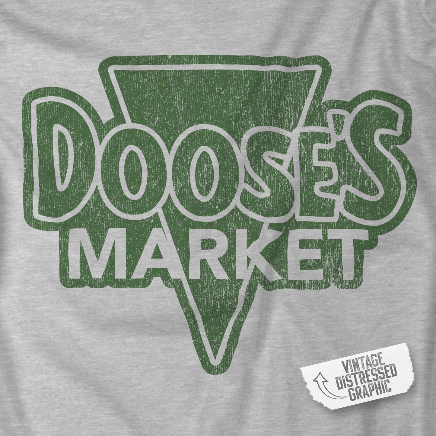 Closeup of Grey Bella+Canvas t-shirt with a vintage-style Doose’s Market logo graphic in green, inspired by Gilmore Girls